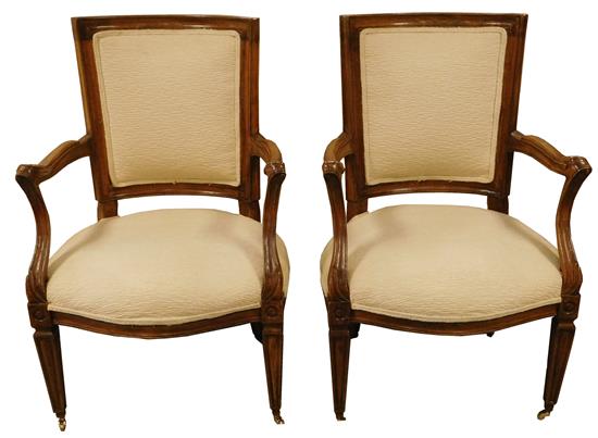 Appraisal: Pair of Italian fruitwood open armchairs cream upholstery four straght