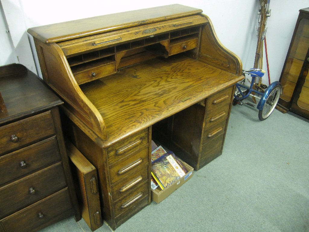 Appraisal: Oak roll-top desk key in office