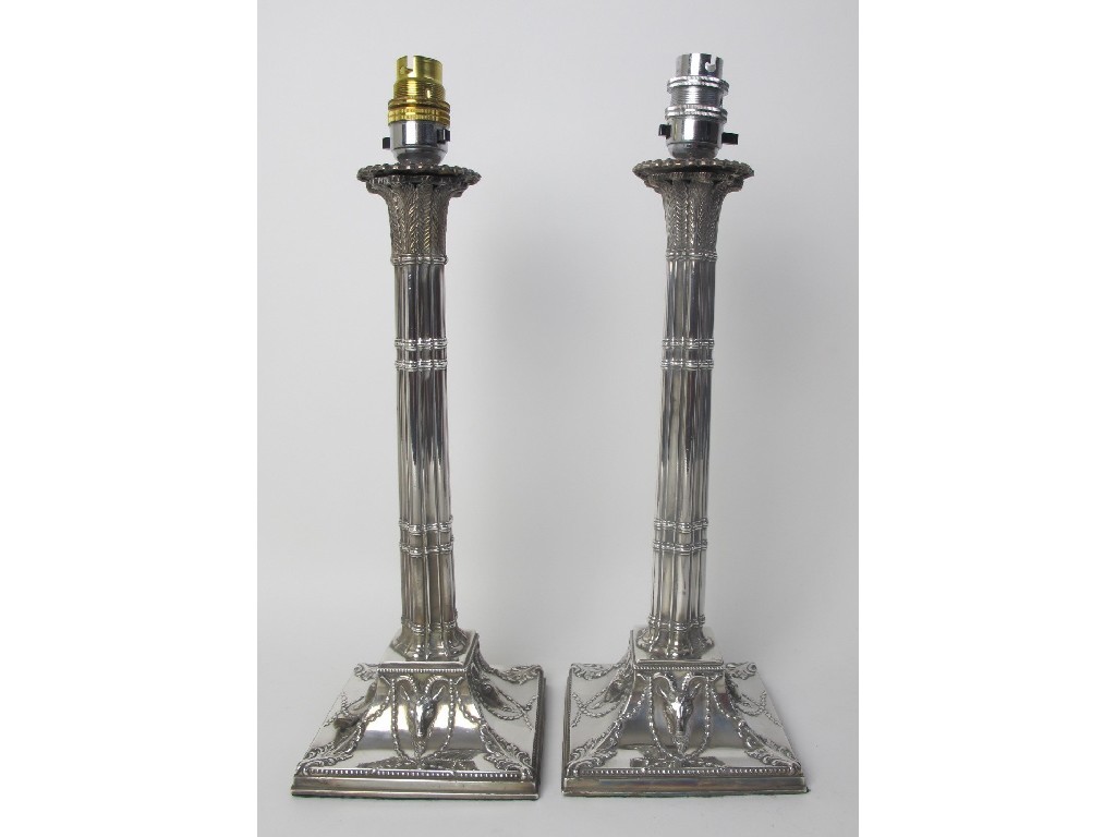 Appraisal: A pair of silver Adam style table lamps with detachable