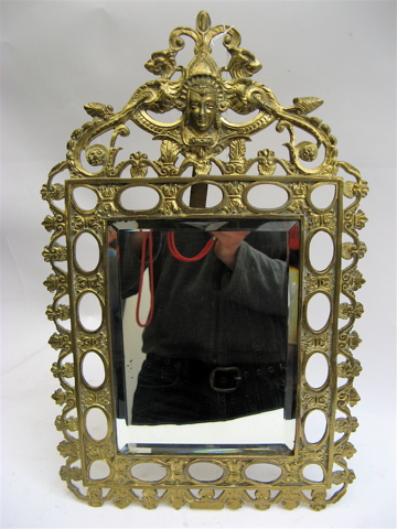 Appraisal: A LATE VICTORIAN BEVELED TABLE TOP MIRROR with pierced gilt