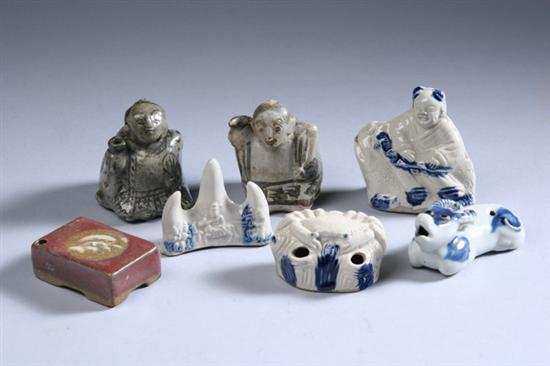 Appraisal: SEVEN PIECES OF ASIAN PORCELAIN WATER DROPPERS AND BRUSH REST