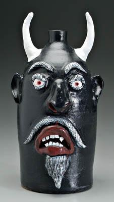 Appraisal: Charles Brown devil jug black red and white painted decoration