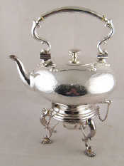 Appraisal: An impressive silver plated tea kettle on stand with lamp