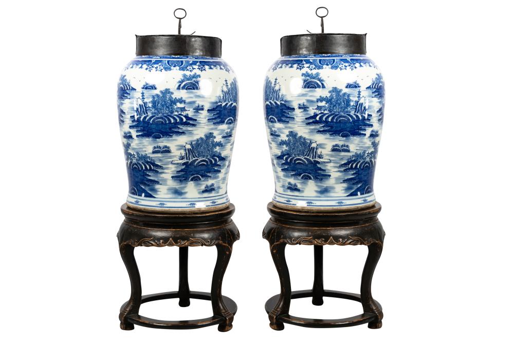 Appraisal: PAIR OF CHINESE BLUE WHITE PORCELAIN TEA JARSon wood stands