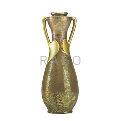 Appraisal: ZSOLNAY Two-handled vase decorated with etched peacock feathers eosin glaze