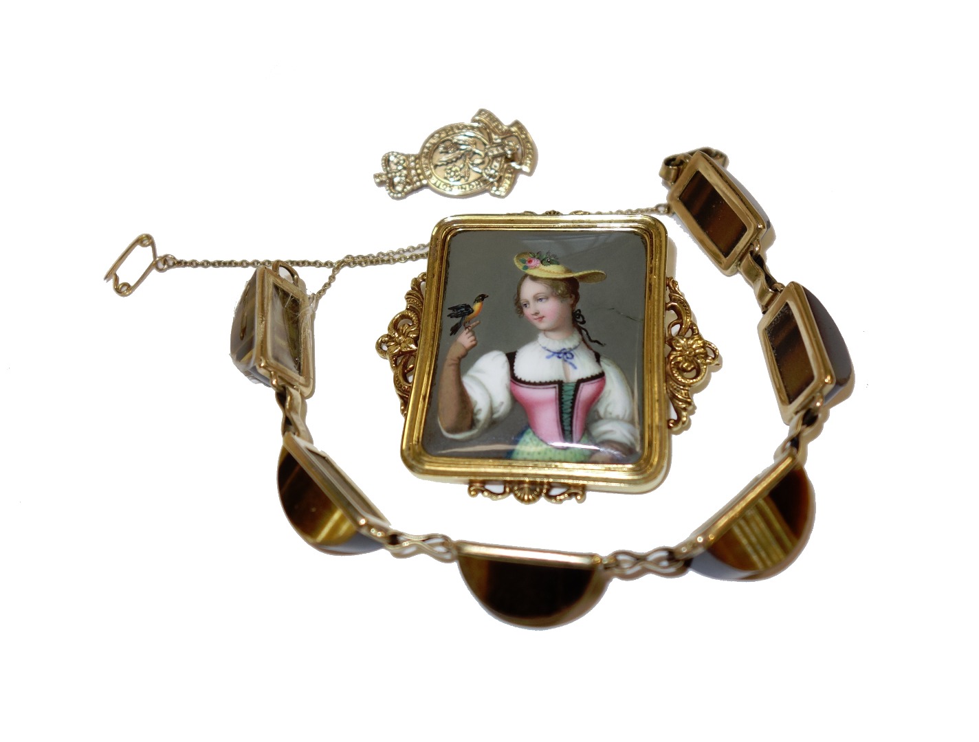 Appraisal: A gold mounted rectangular Swiss enamelled brooch decorated with the