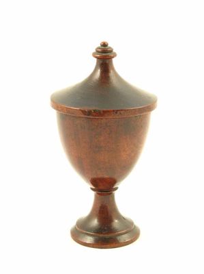 Appraisal: An early th century turned treen urn and cover with