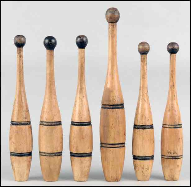 Appraisal: SIX TURNED WOOD INDIAN CLUBS Tallest '' Condition No Specific