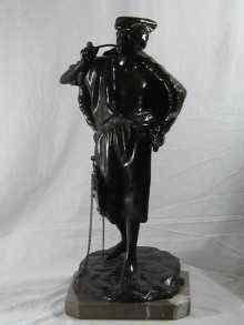 Appraisal: After Achille D'orsi A bronze figure of a fisherman a