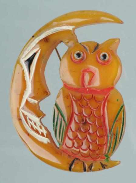 Appraisal: Vintage Bakelite Butterscotch Moon Owl Pin Description Original paint Condition