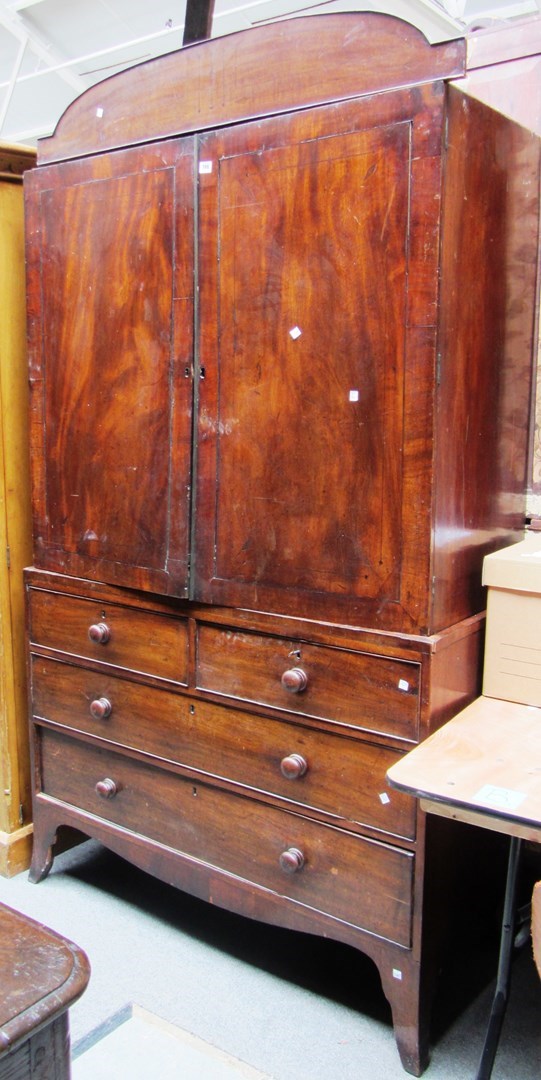 Appraisal: A William IV mahogany linen press the pair of doors