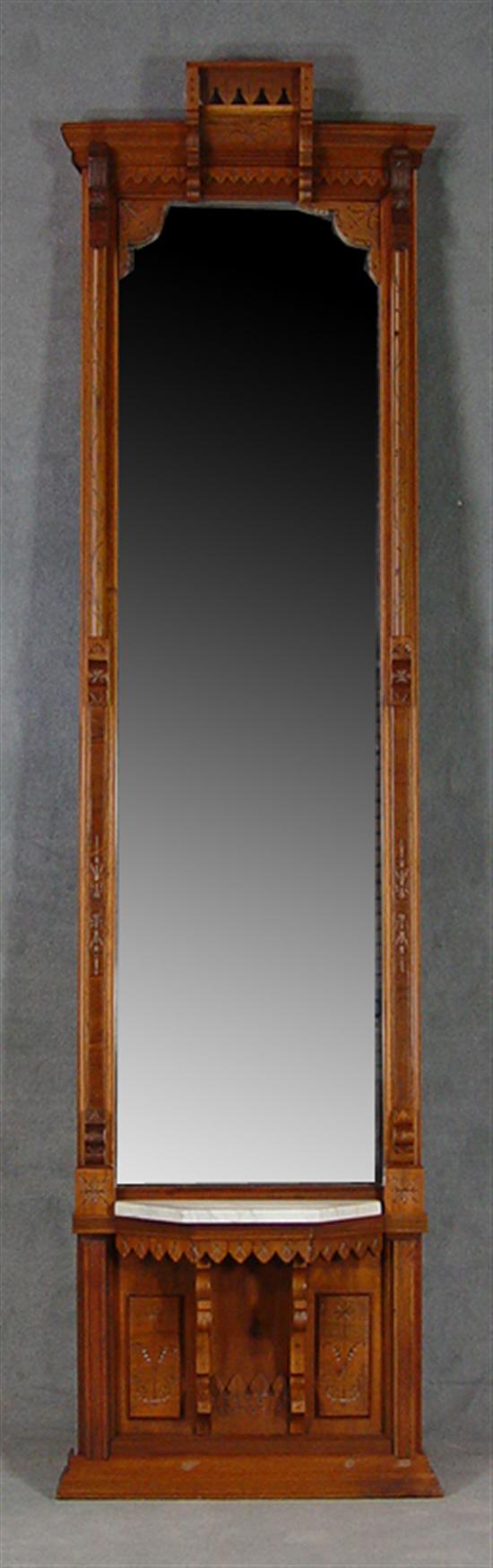 Appraisal: Aesthetic Revival Pier Mirror Circa Walnut and veneers Desirable vertical