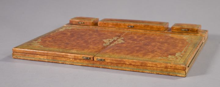 Appraisal: Florentine Gilt-Tooled Russet Leather Folding Desk Set of folio form