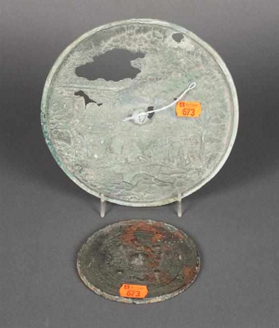 Appraisal: Two Chinese bronze mirrors One with populous landscape design in