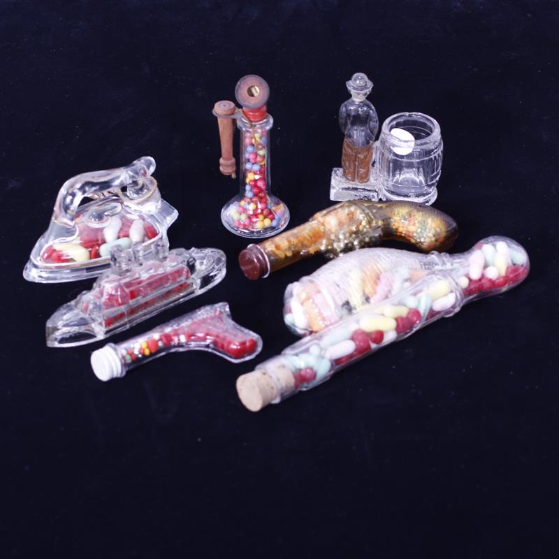 Appraisal: Lot of seven glass candy containers H Phone