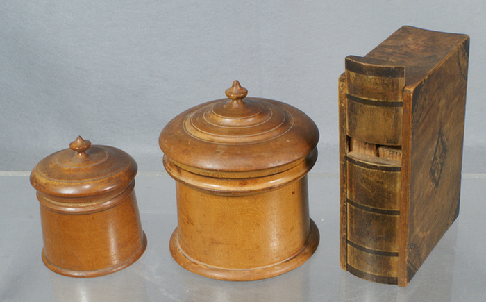 Appraisal: treenware round covered boxes tallest with an inlaid book form