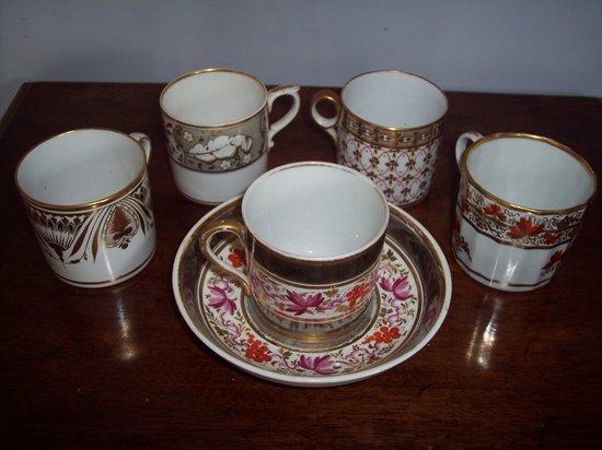 Appraisal: An early th Century coffee can and saucer decorated vines