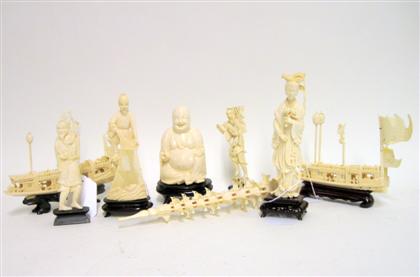 Appraisal: Eight Chinese elephant ivory carvingsComprising two well-detailed barges with removable