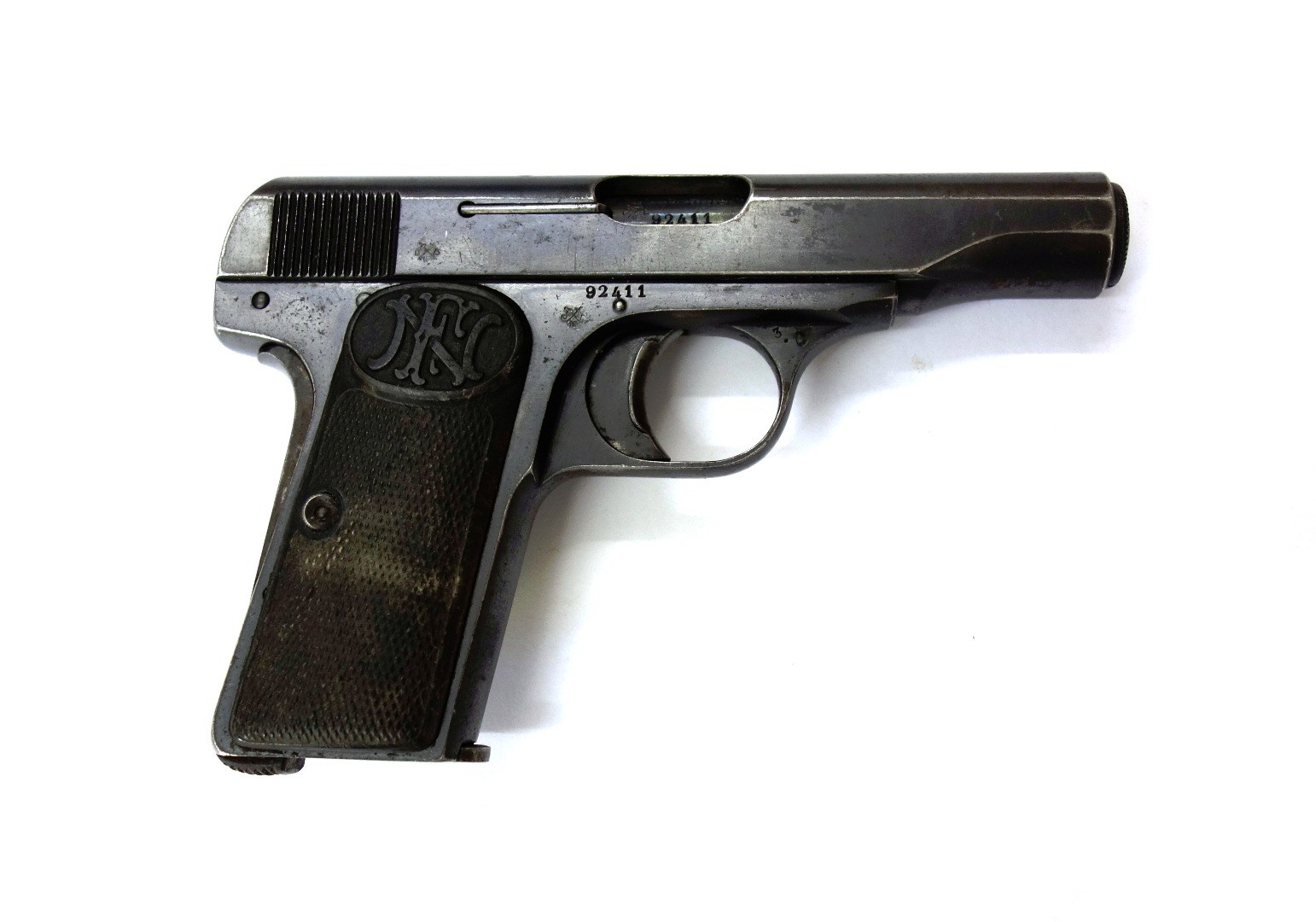 Appraisal: A mm Belgian F N semi-automatic pistol with an cm