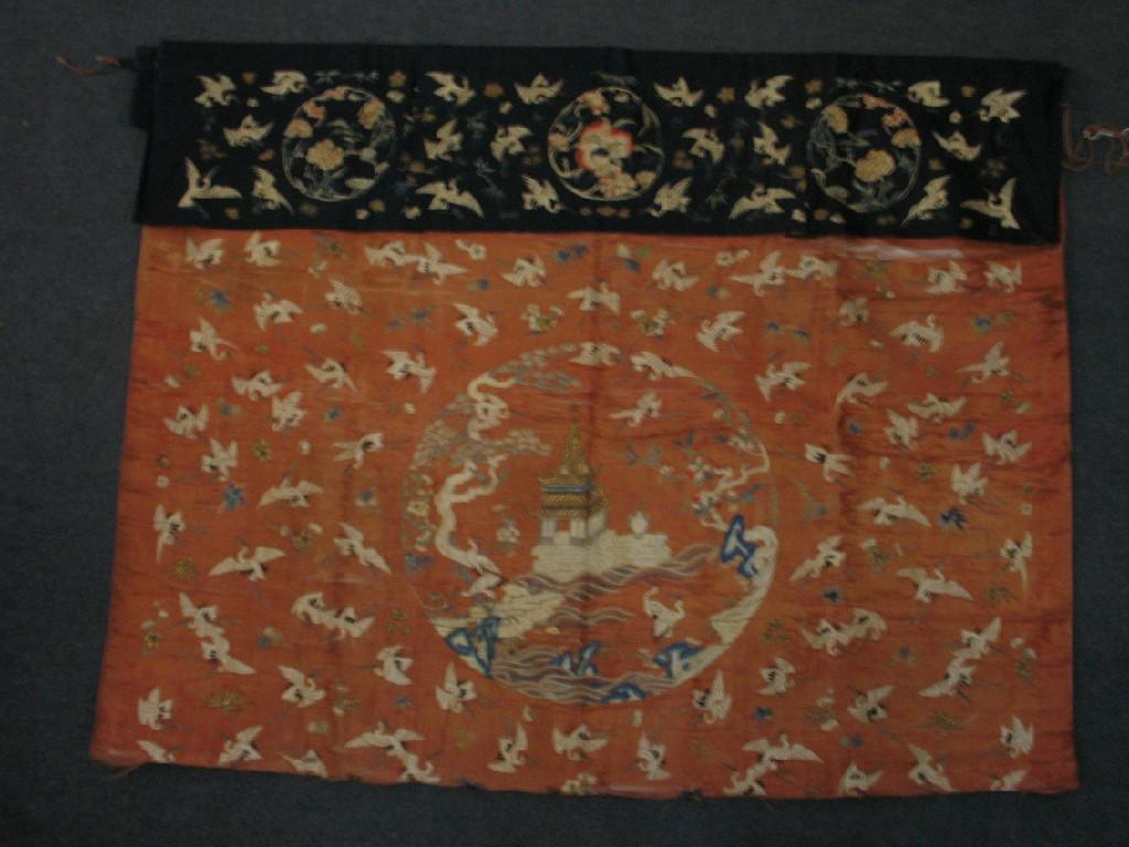 Appraisal: A CHINESE SILK AND GOLD THREAD EMBROIDERED PANEL the blue-ground