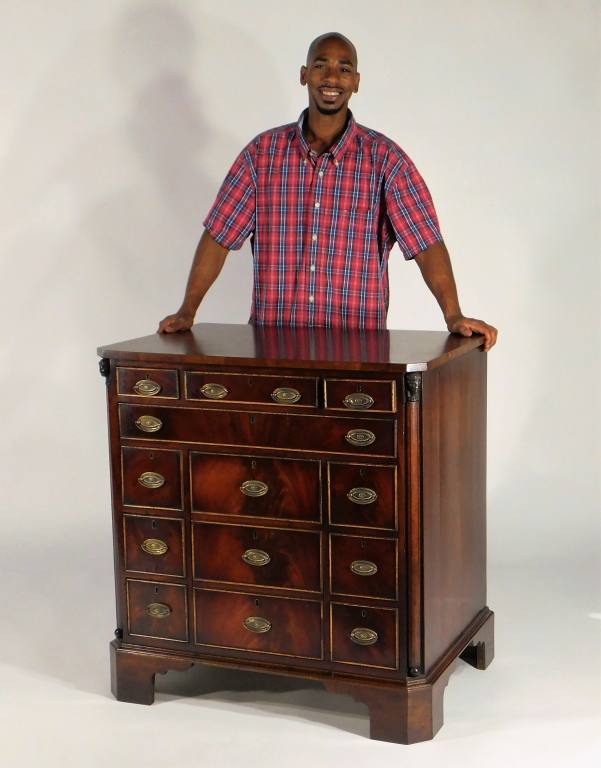 Appraisal: EGYPTIAN REVIVAL FIGURED MAHOGANY CHEST OF DRAWERS Europe Early th