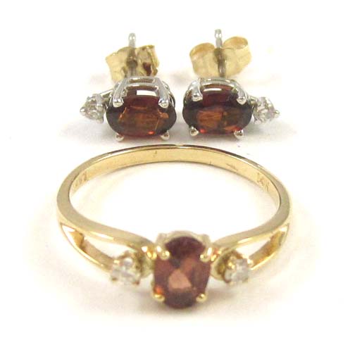 Appraisal: GARNET AND DIAMOND JEWELRY IN FOURTEEN KARAT GOLD consisting of