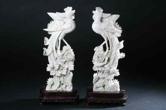 Appraisal: PAIR CHINESE WHITISH JADEITE FIGURE OF PHOENIX BIRDS Standing with