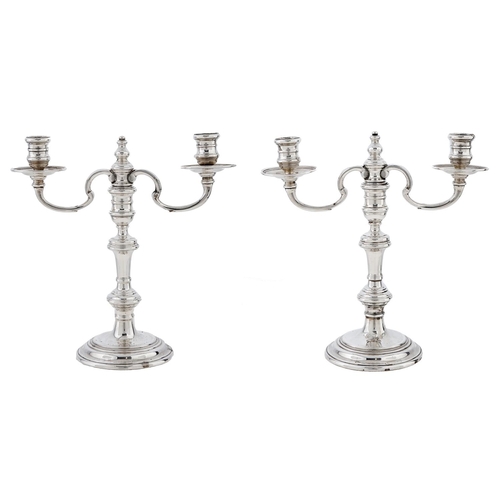 Appraisal: A pair of Elizabeth II silver candelabra in Queen Anne