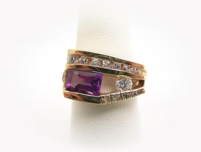 Appraisal: Lady's k yellow gold amethyst and diamond ring with approximately