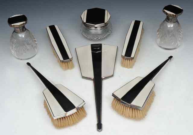 Appraisal: An Art Deco eight piece dressing table set black and