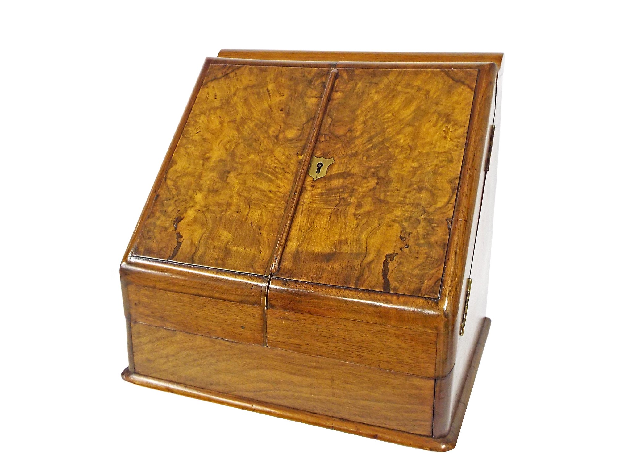 Appraisal: Victorian burr walnut stationery box with twin sloping doors enclosing