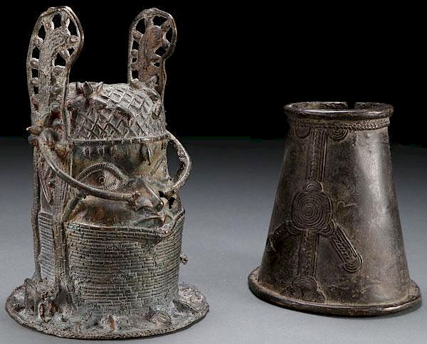 Appraisal: A PAIR OF BENIN OR BENIN STYLE BRONZES TH C