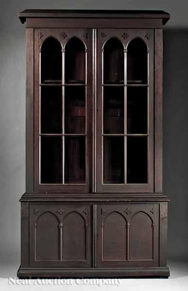 Appraisal: An American Gothic Carved and Faux Bois Bookcase c height