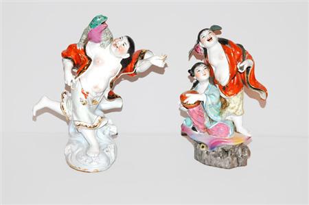 Appraisal: Two Chinese Porcelain Figures Estimate -