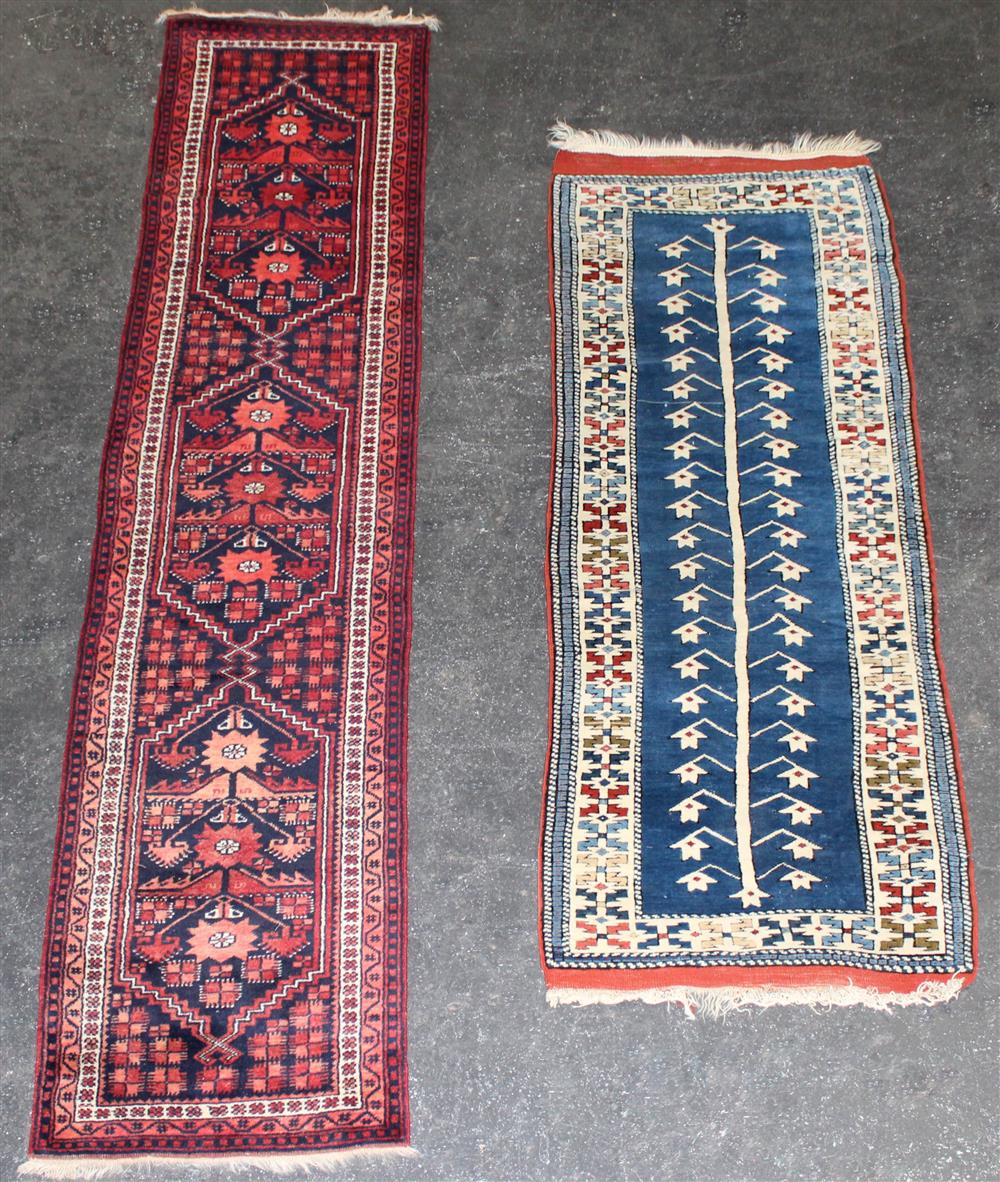 Appraisal: TWO CAUCASIAN TRIBAL RUNNERS INCLUDING A KAZAK the Kazak with