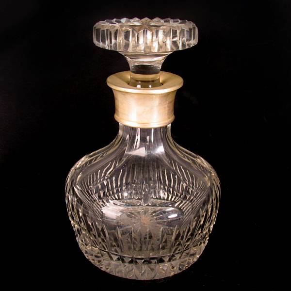 Appraisal: A crystal decanter with sterling silver collar height in diameter