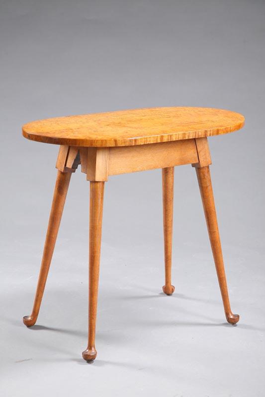 Appraisal: TAVERN TABLE Reproduction table with an oval birdseye maple top