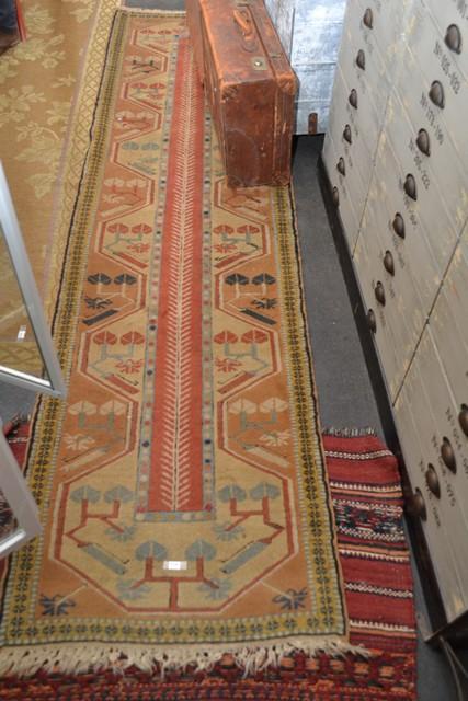 Appraisal: AN AFGHAN STYLE RUNNER IN LIGHT BROWN AND YELLOW TONES