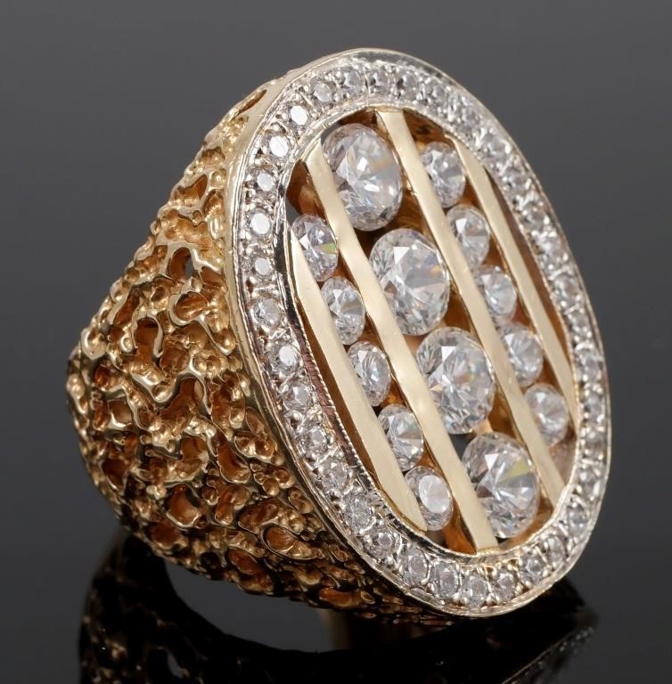 Appraisal: K yellow gold ring contains CZs Weight grams Size