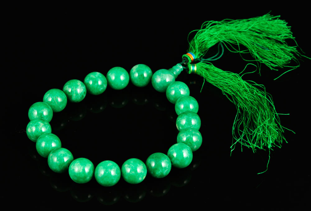 Appraisal: - Chinese Green Jadeite Beads Green jadeite beads China