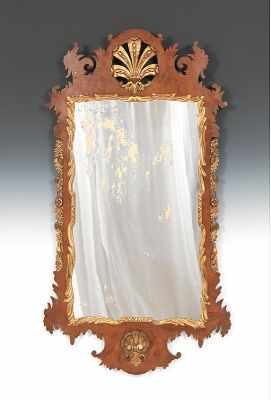 Appraisal: A Federal Style Mirror Intricately cut silhouette in burlwood veneer