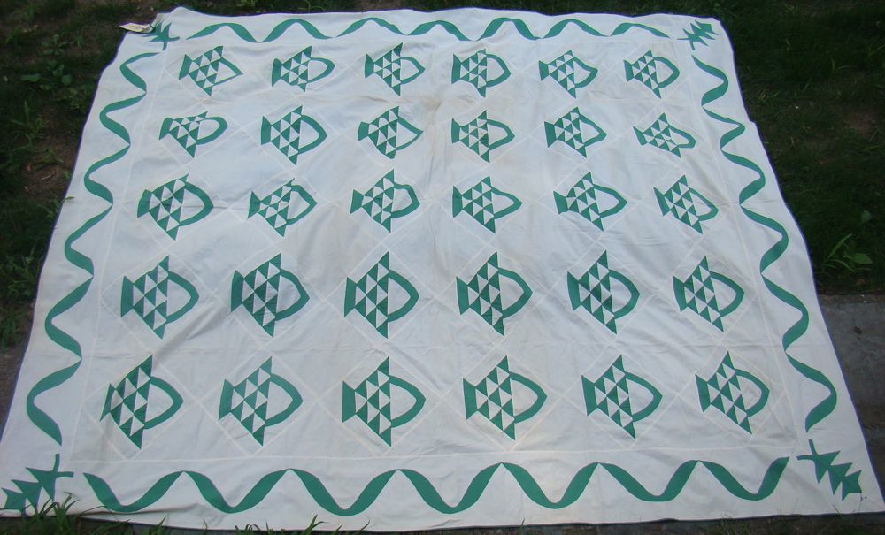 Appraisal: GREEN AND WHITE COVERLET Late th Early th CenturyIn flower