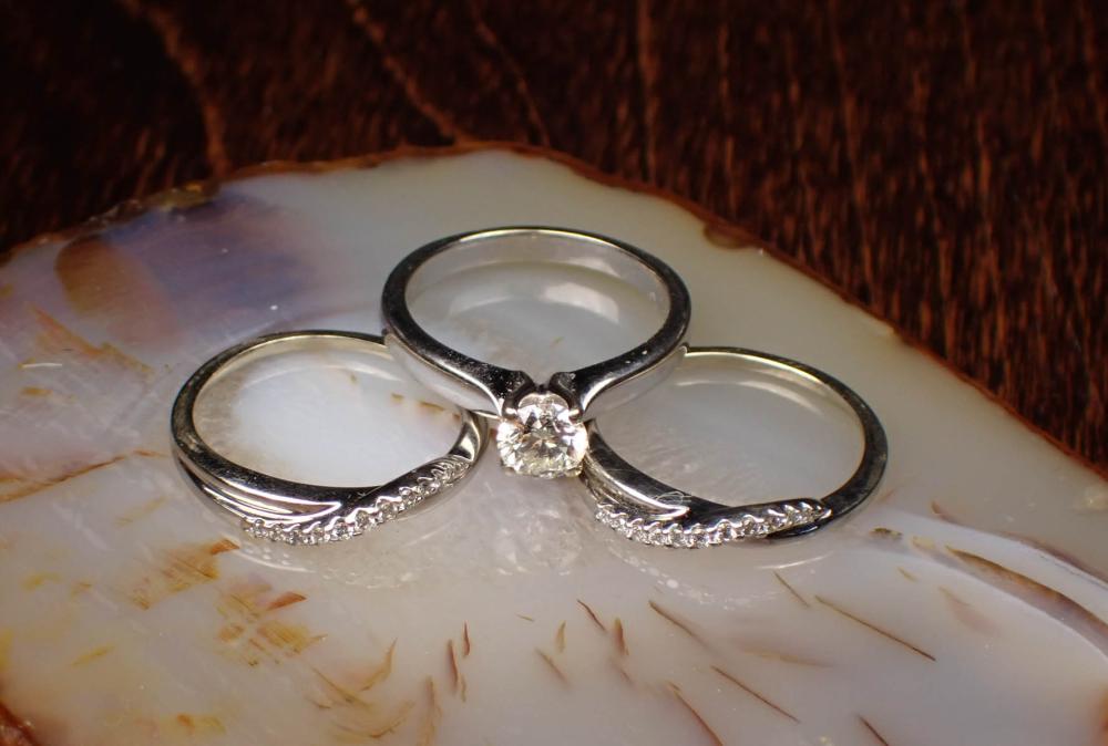 Appraisal: ESTATE DIAMOND AND WHITE GOLD TRIO WEDDING SET including an