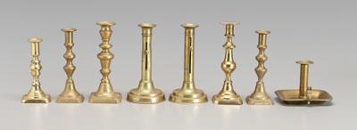 Appraisal: Eight brass candlesticks one pair with cylindrical shafts marked Made