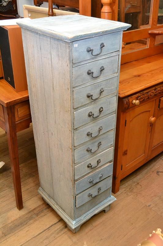 Appraisal: A TALL RUSTIC PAINTED NINE DRAWER CHEST A TALL RUSTIC