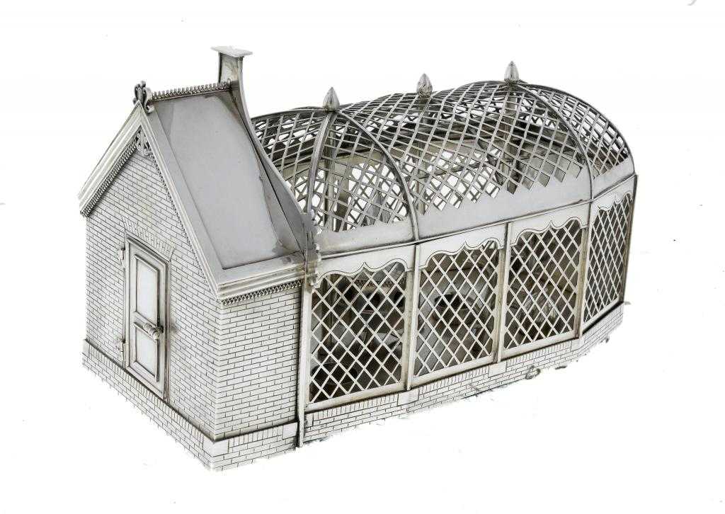 Appraisal: AN SILVER MODEL OF AN AVIARY with trellis walls and