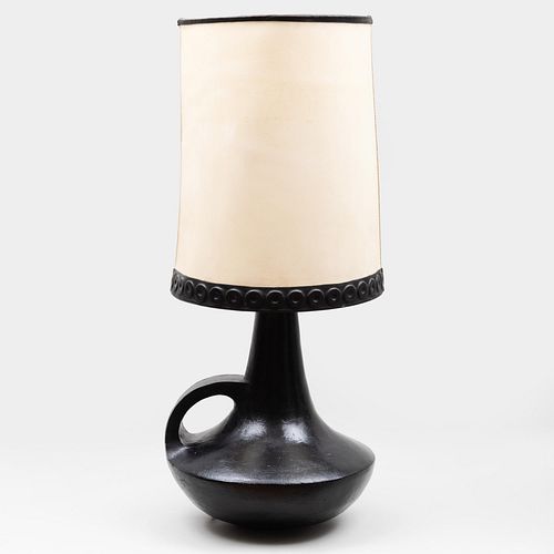 Appraisal: FRENCH BLACK GLAZED ART POTTERY LAMP WITH A CUSTOM SHADE