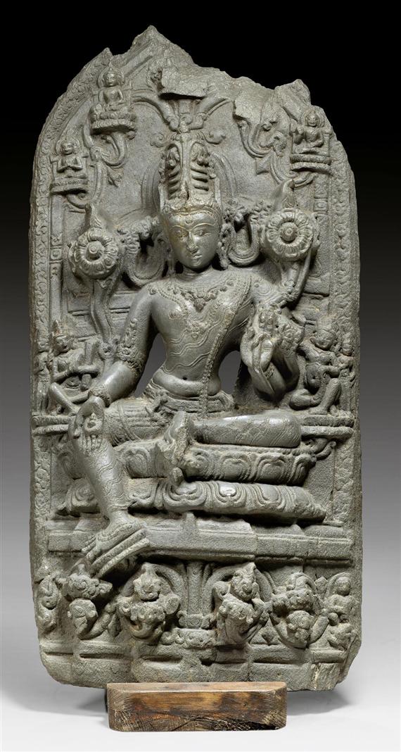 Appraisal: A BLACK STONE STELE OF THE GODDESS TARA Northeastern India