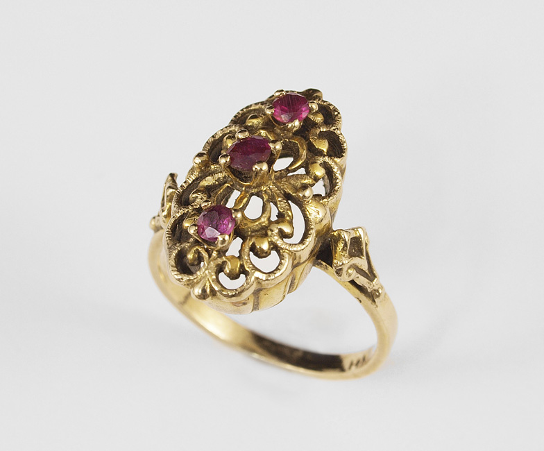 Appraisal: K RUBY FILIGREE RING K yellow gold ring contains round