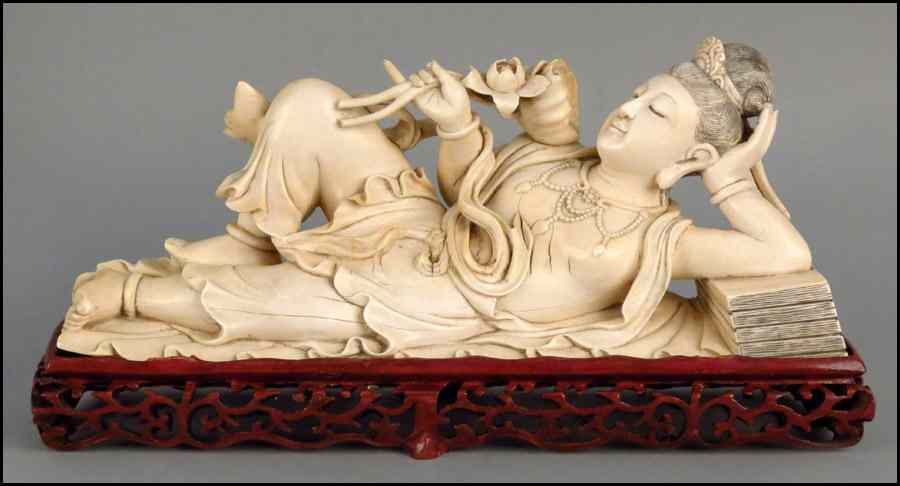 Appraisal: CHINESE CARVED IVORY FIGURE OF A RECLINING WOMAN Provenance The